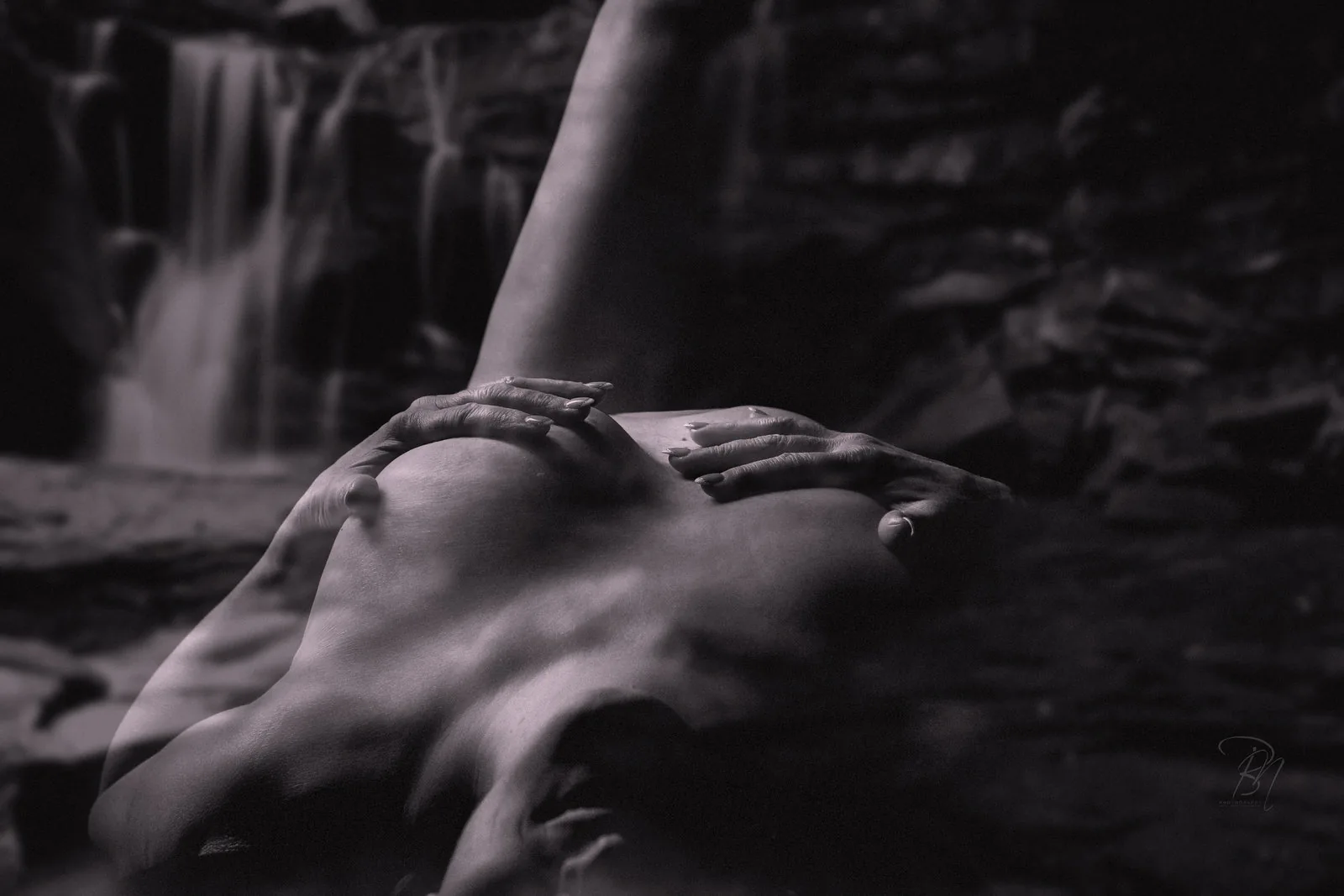 Waterfall — Photo: Norbert Banhalmi A reclining body and a waterfall share the same frame in double exposure.