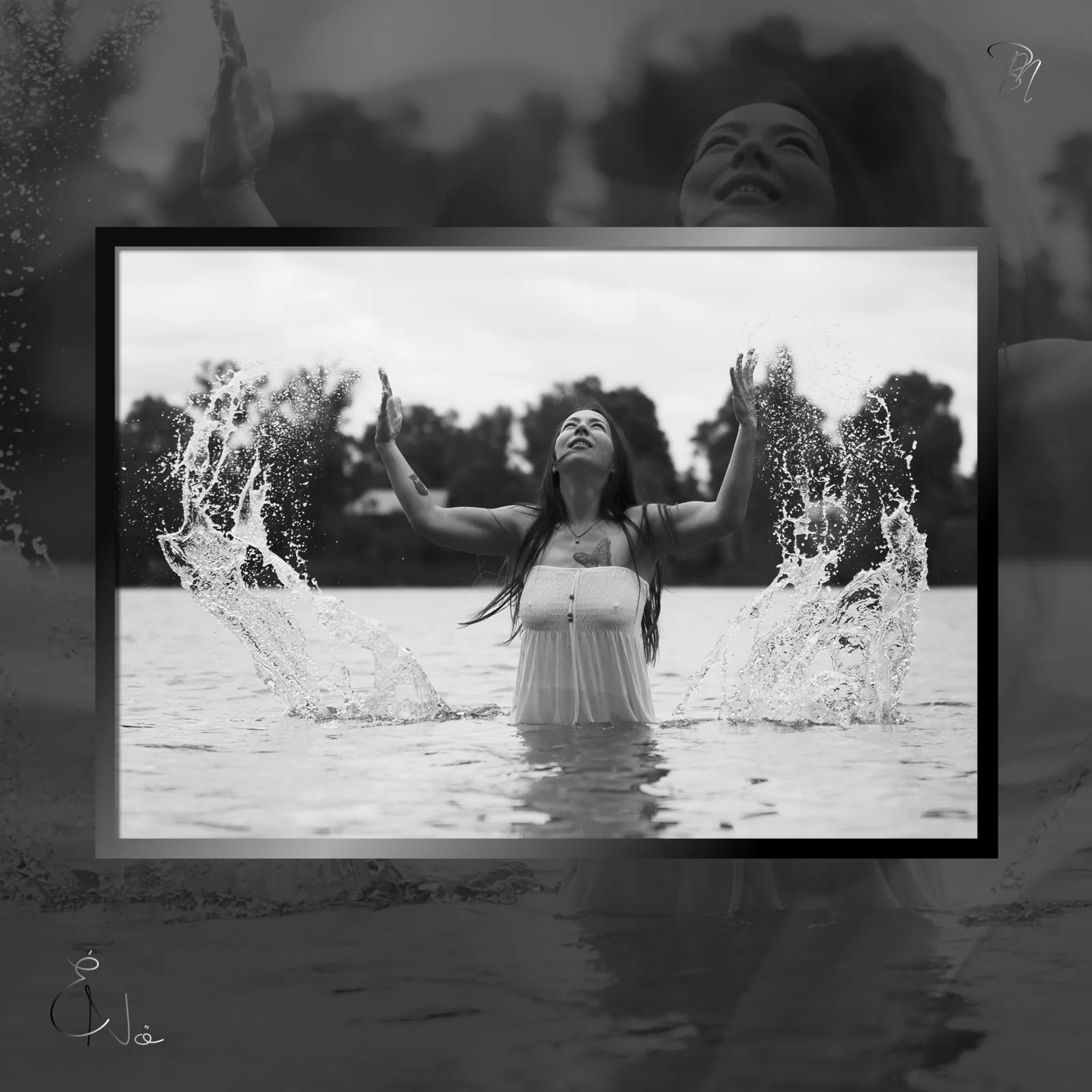 Splash — Photo: Norbert Banhalmi Black and white: a woman throws water into the air with both hands, standing waist-deep.