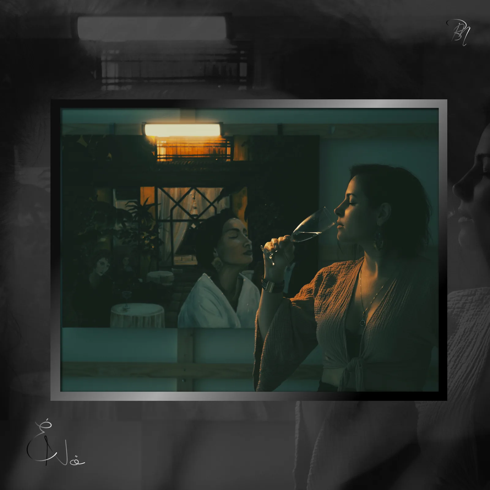 Green room — Photo: Norbert Banhalmi Two women in a green-lit interior, one raising a glass.