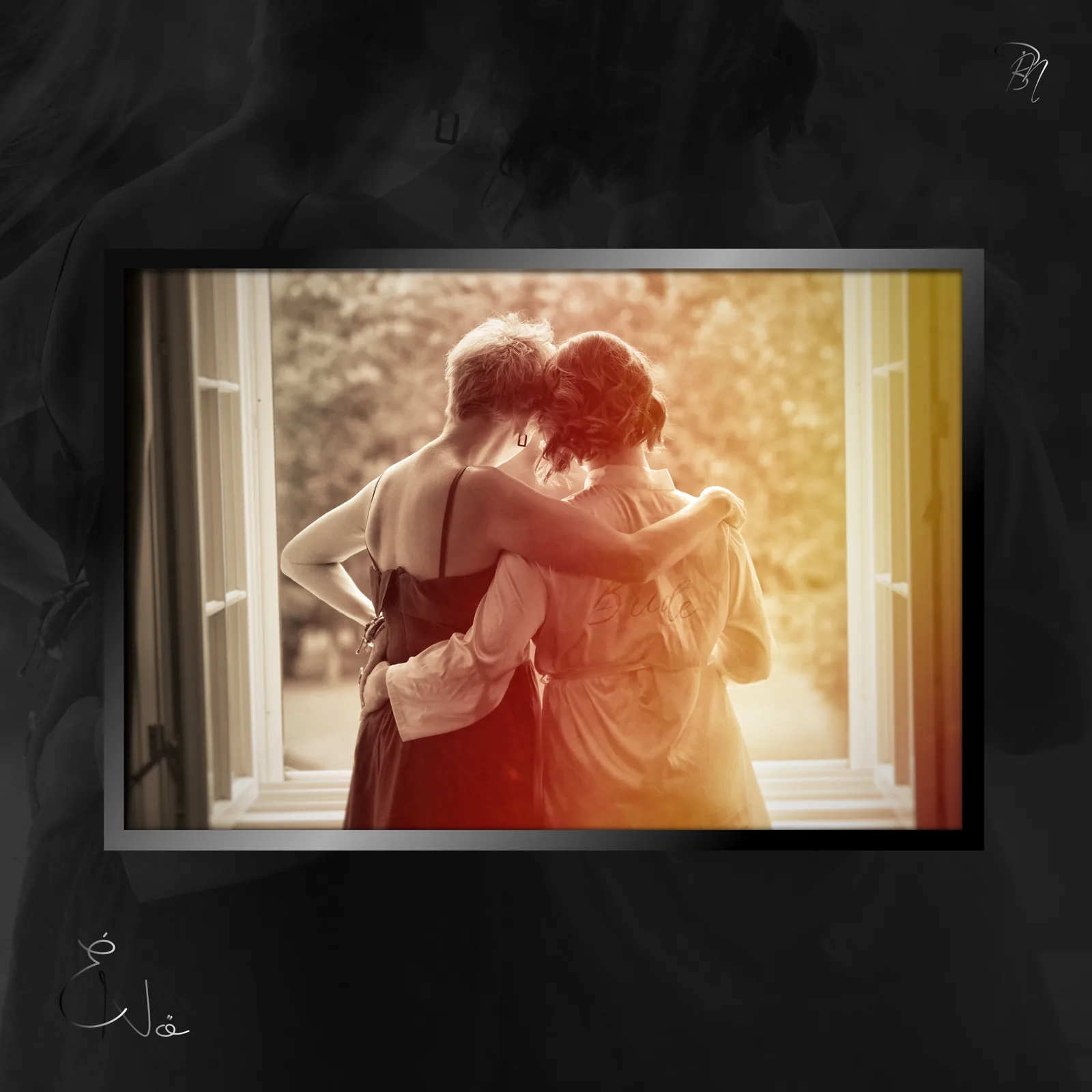 Two by the window — Photo: Norbert Banhalmi Two women embrace by a bright window in warm golden light.
