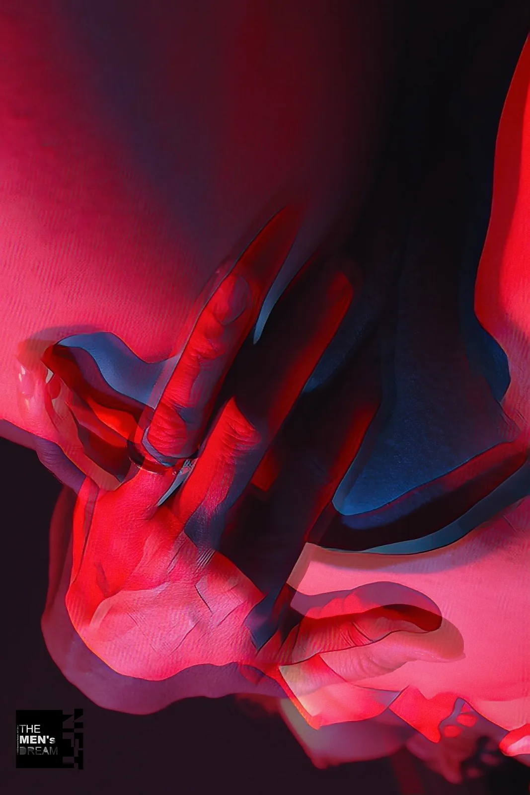 Red hands — Photo: Norbert Banhalmi Hands multiplied by motion blur against a deep red and blue field.